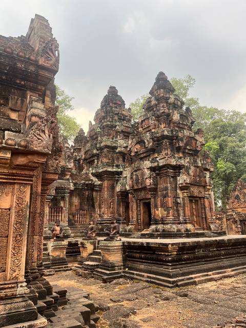 An ancient temple with intricate carvings and towering structures.