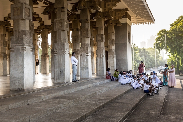 Children participating in a cultural event at a historic site.