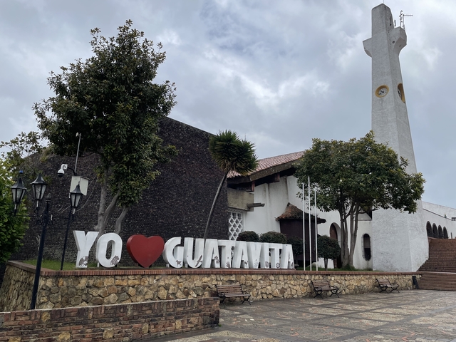       Building with a sculpture and large letters
  