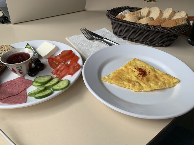 Traditional Turkish breakfast with various dishes.