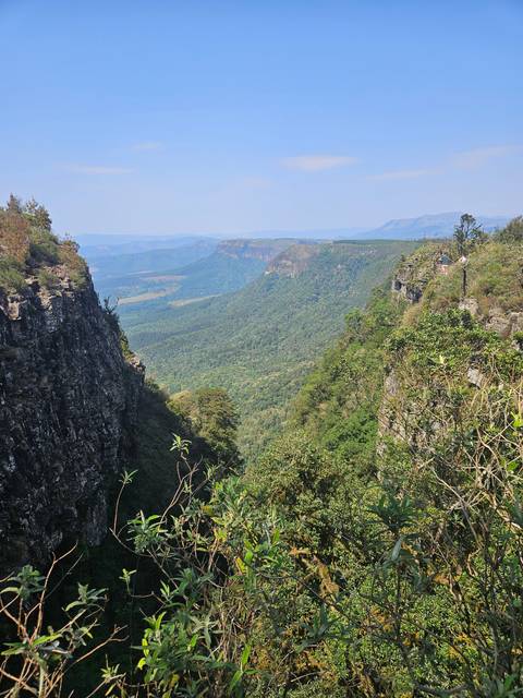       A view from a high vantage point overlooking a vast landscape.
  