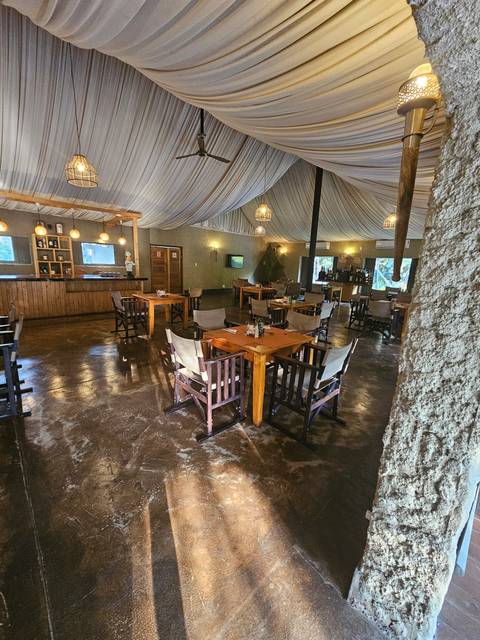       Lodge interior with rustic decorations.
  