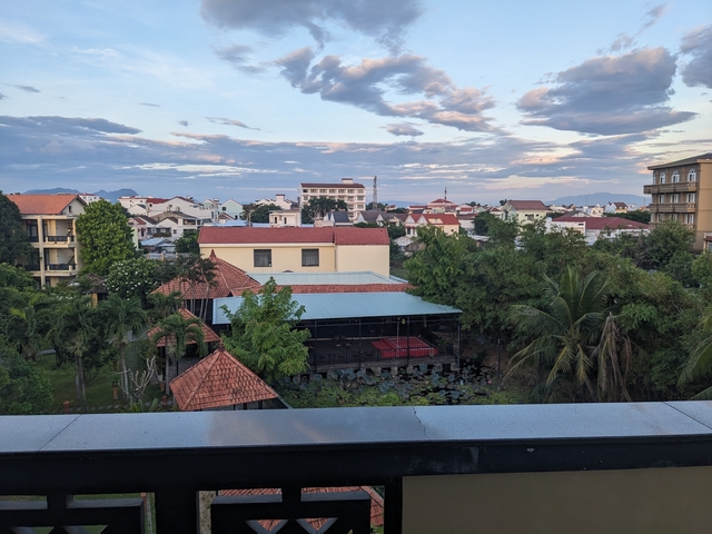       Suburban area with many houses and greenery.
  