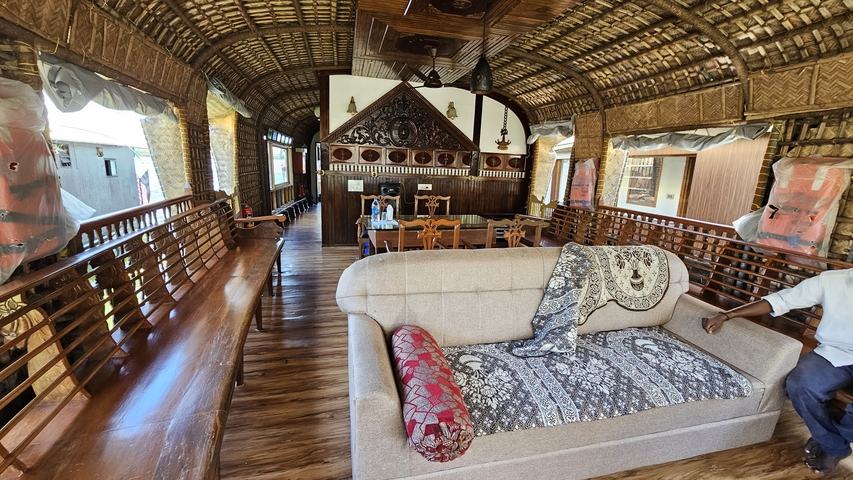 Interior of a traditional houseboat with elegant decor.