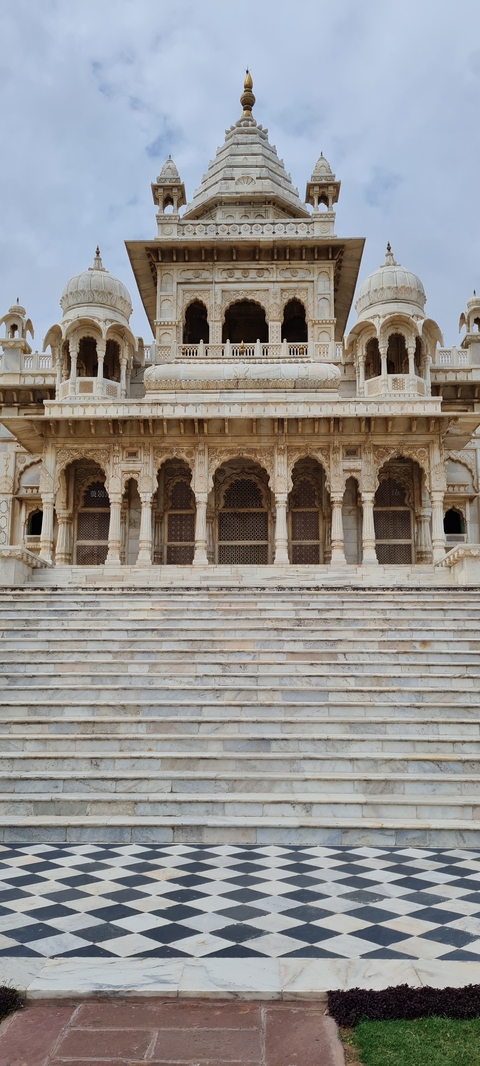       Historic tomb with intricately designed arches.
  