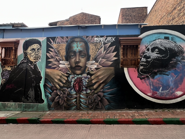 Colorful street art mural on a wall.