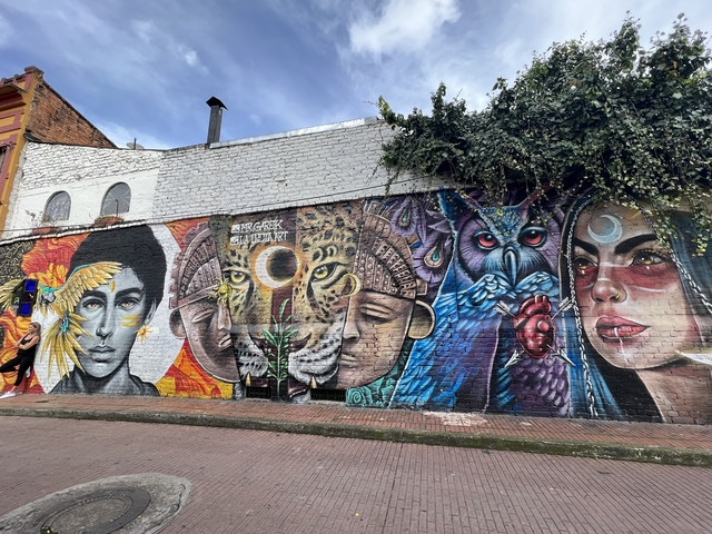 Vibrant street art with various characters and animals.