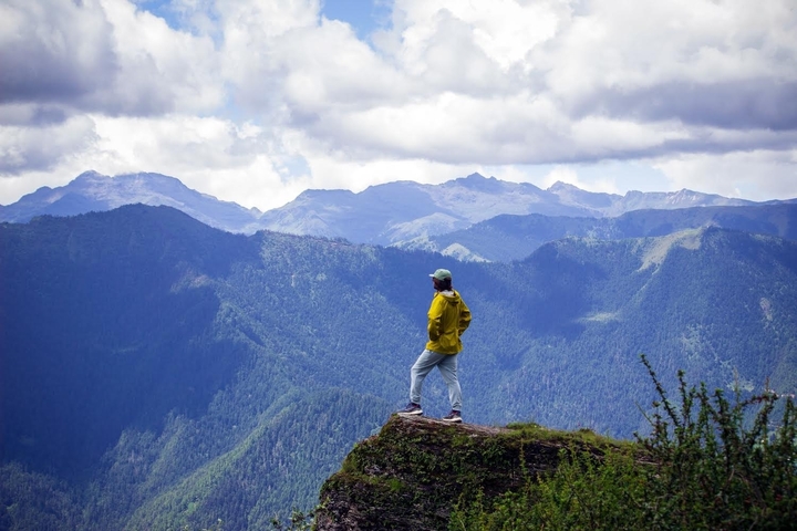 Person looking at mountain ranges in the distance