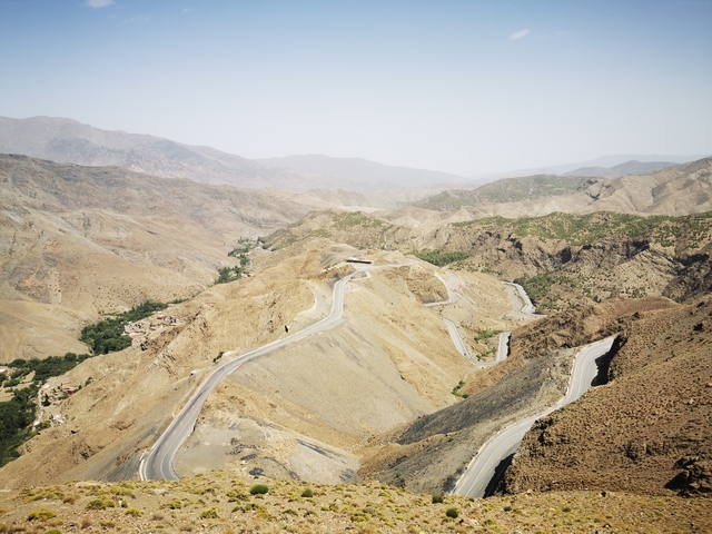       Winding roads through mountains offering a panoramic view
  