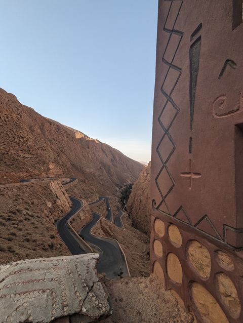       Road winding through a dramatic canyon.
  