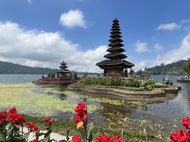 Iconic temple complex surrounded by water and flora