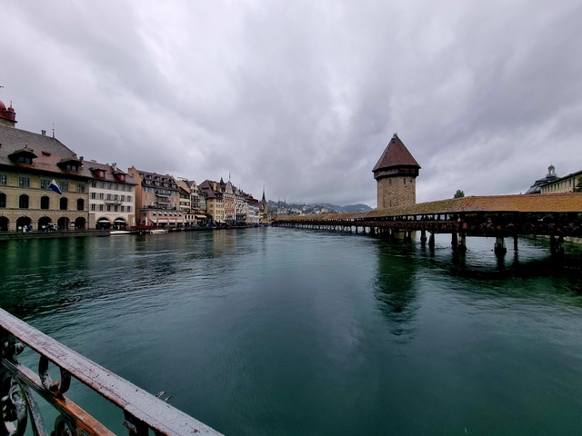 Chapel Bridge in Lucerne with water reflections.