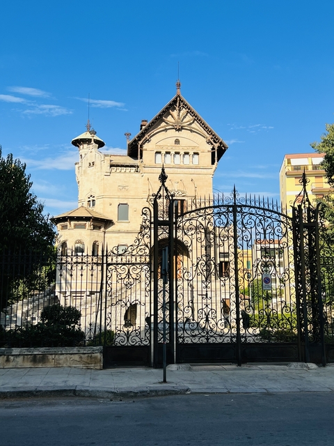 Ornate historic villa with decorative features.