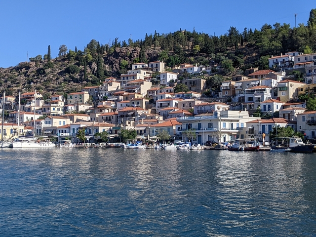 Seaside town with traditional houses and boats.