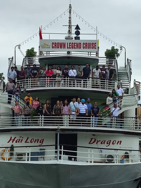 Group of people standing on a multi-tiered boat deck