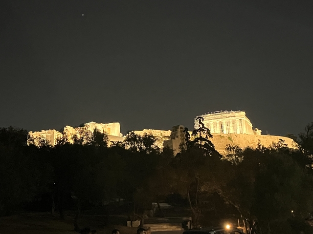       Close-up view of the Parthenon lit up at night
  
