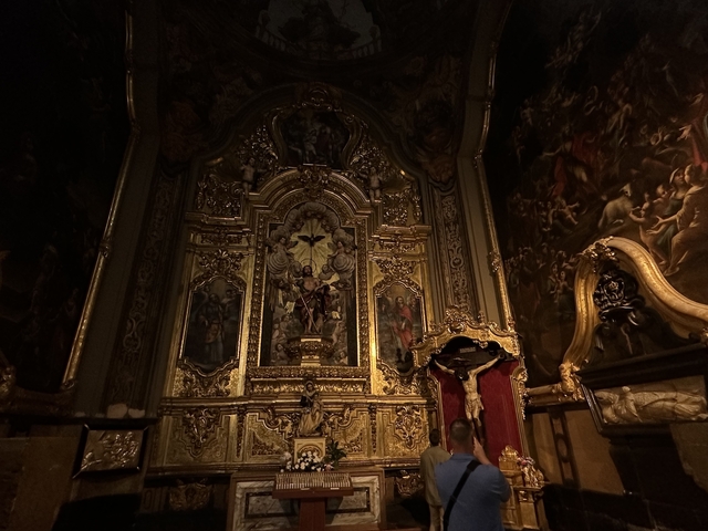 Ornate religious altar with gold detailing.