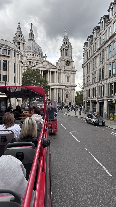 City street view from a double-decker bus.