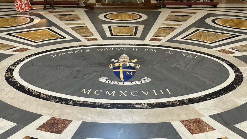 Decorative floor with religious inscriptions.