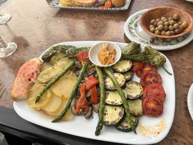 Plate with grilled vegetables and sauces.