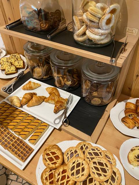       Display of various pastries and baked goods.
  