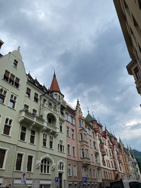 Row of colorful historic buildings with European architecture.