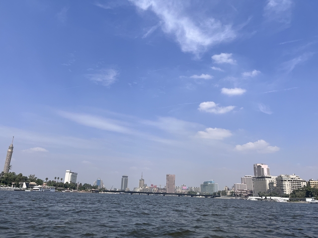       City skyline along the Nile river.
  