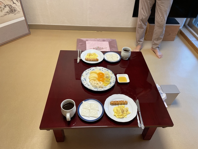       A traditional Korean breakfast set on a table.
  