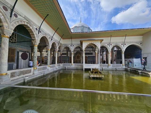       Beautiful courtyard with arches and pool.
  