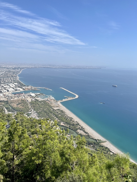       Aerial view of a coastal city and coastline
  
