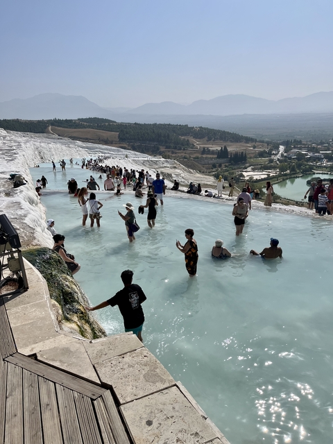      People enjoying the thermal terraces.
  