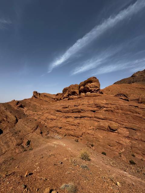 Rock formations against a blue sky.