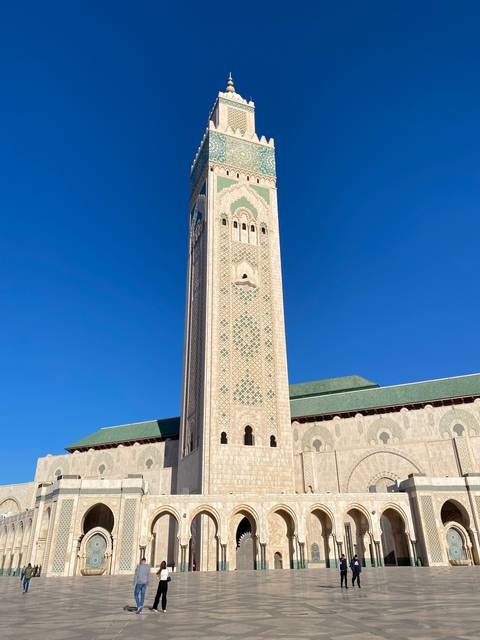       Large mosque structure with intricate designs.
  