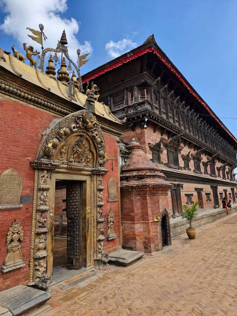 Historic building with sculptural decorations.