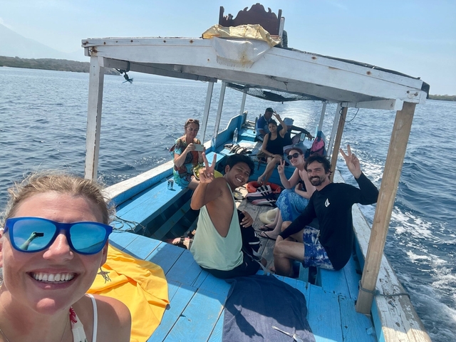 Group of people on a boat enjoying their time on water.