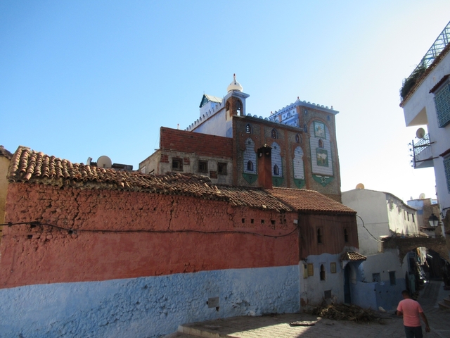       Traditional Moroccan building with colorful tiles.
  