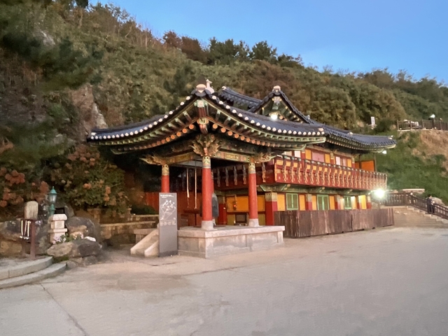       Traditional Korean temple at dusk.
  