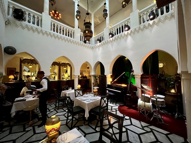      Elegant restaurant interior with jazz setup.
  