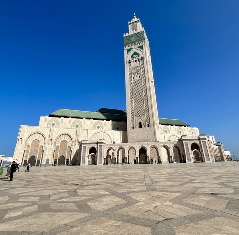       Hassan II Mosque with clear blue sky.
  