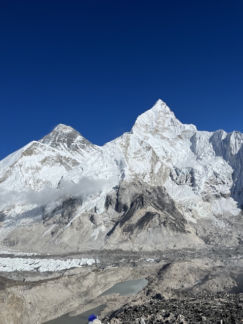 Snowy mountain peaks under a clear sky.