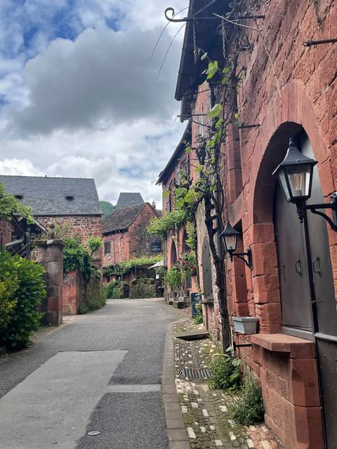 Historical street view with red brick buildings.