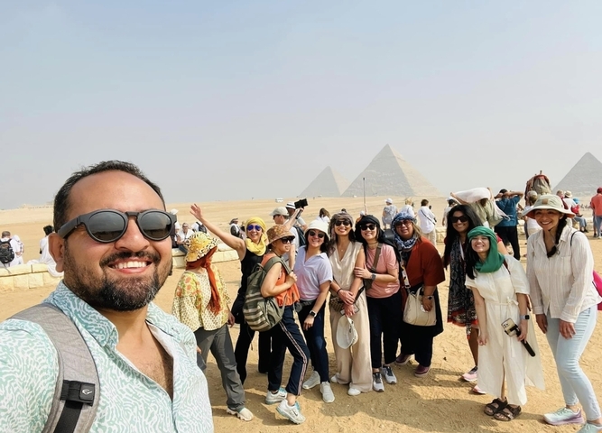       Group in front of Pyramids in Giza
  