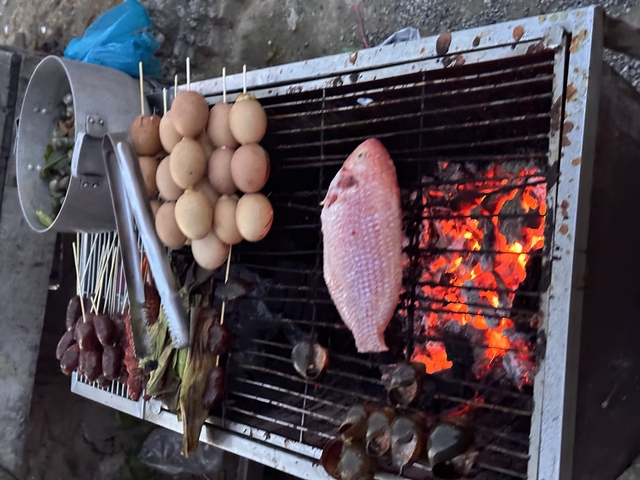      Grilled food being prepared on a barbecue
  