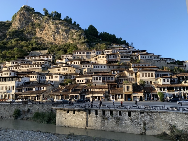       Traditional stone houses built on a hill.
  