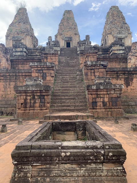       Ancient stone steps leading up a temple.
  