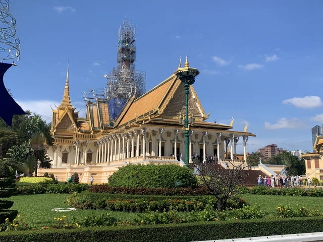 Royal Palace with golden spires and traditional architecture.