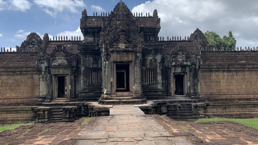       An ancient temple with intricate carvings and stone architecture.
  
