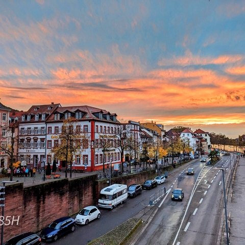 Colorful sunset over a quaint European town.