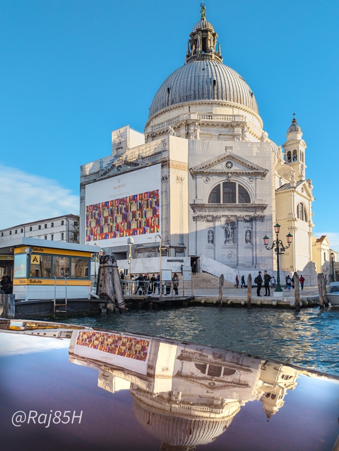 Building under restoration with scaffolding in Venice.