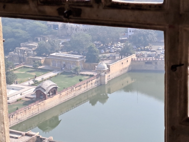 Aerial view of a fort situated next to a lake.